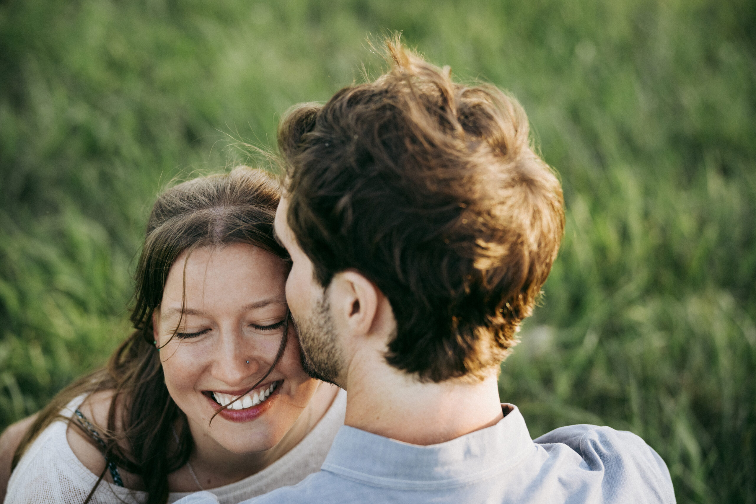 Intimate close up of couple holding hands