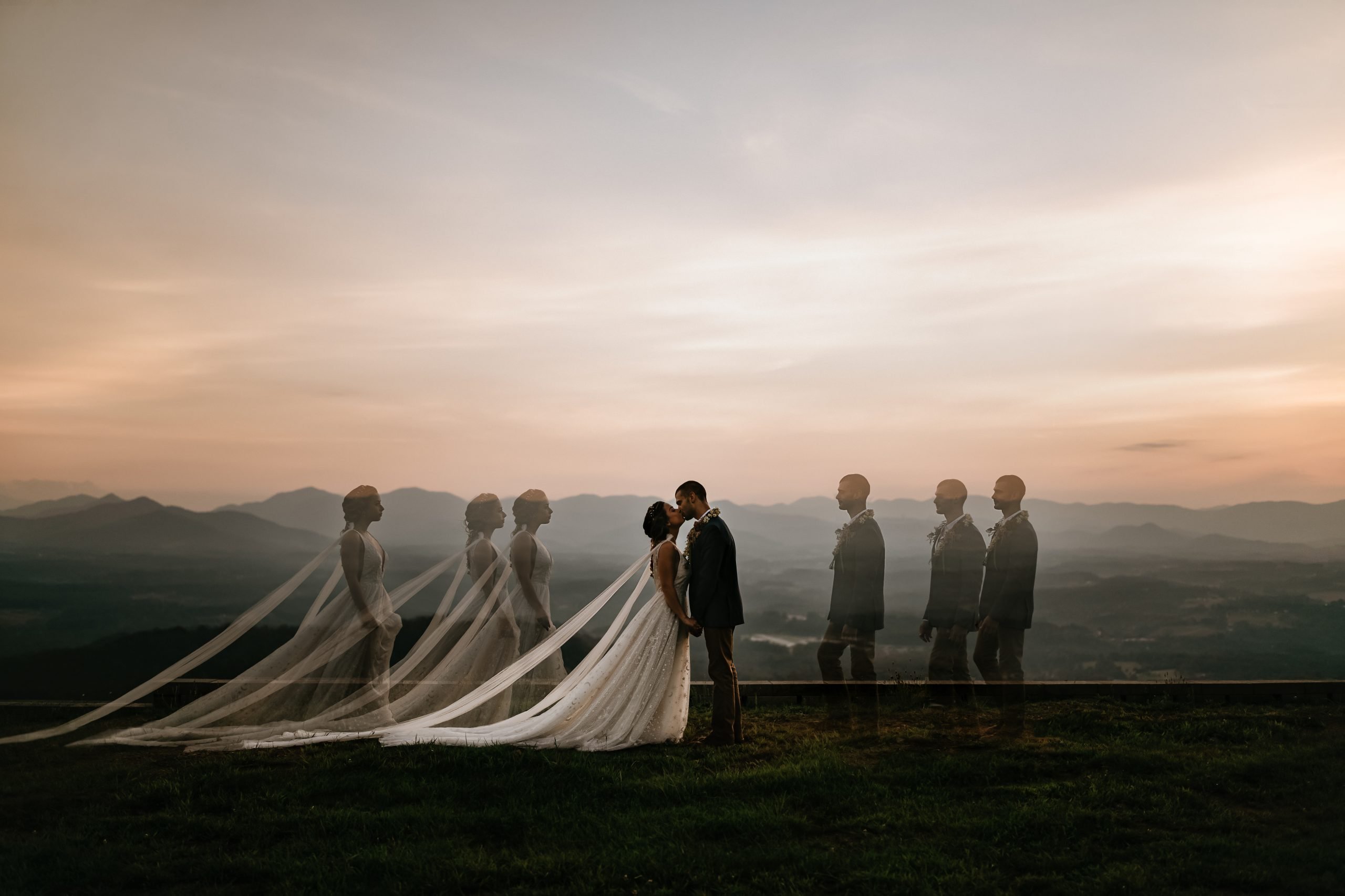 Artsy wedding couple shot
Creative double-exposure of bride and groom on mountaintop, fine art wedding photography blending editorial and documentary style.