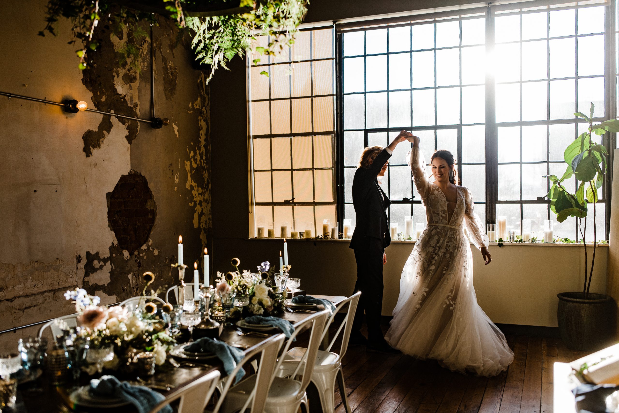 Rhubarb event space
Bride and groom dancing by the tall windows of Rhubarb in Asheville, intimate wedding celebration with natural light photography.