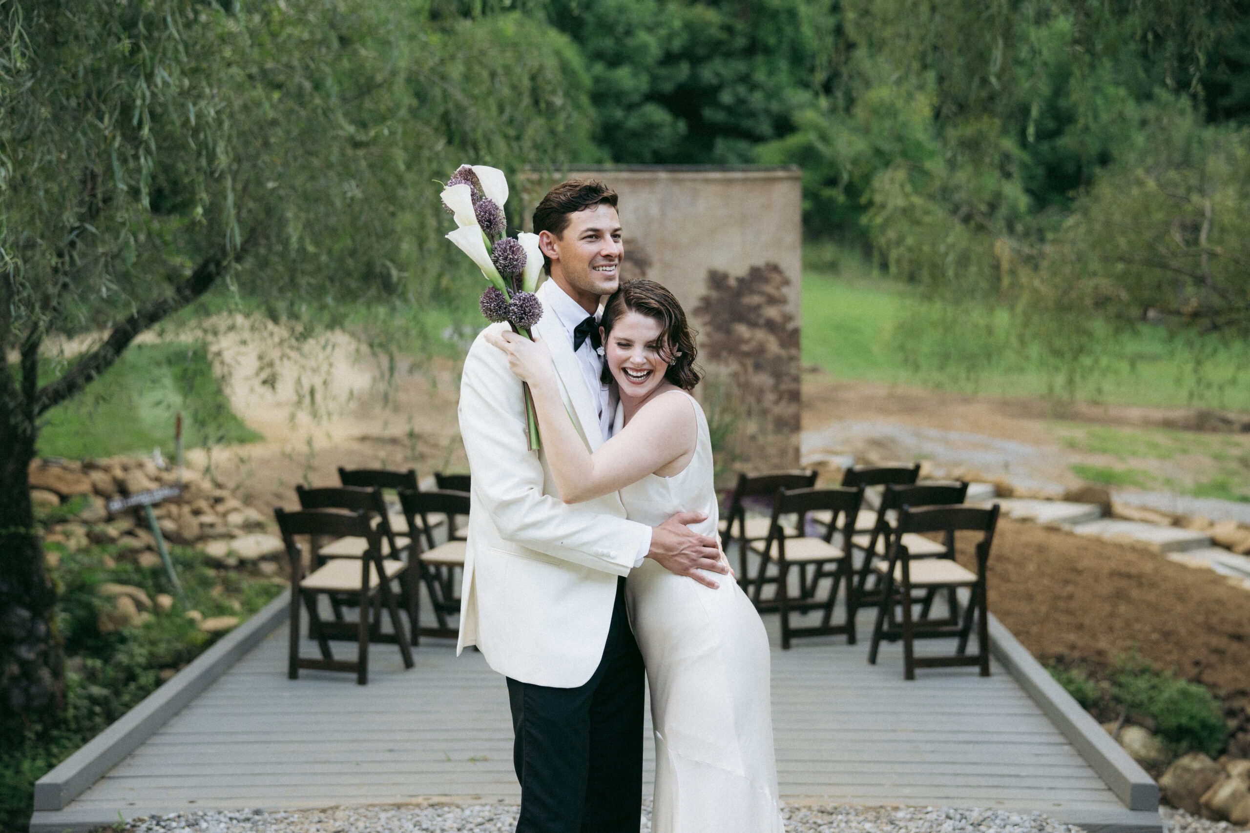 Caya Azul (new venue)
Joyful couple celebrating their wedding at Caya Azul, a new Asheville wedding venue, photographed with editorial elegance.