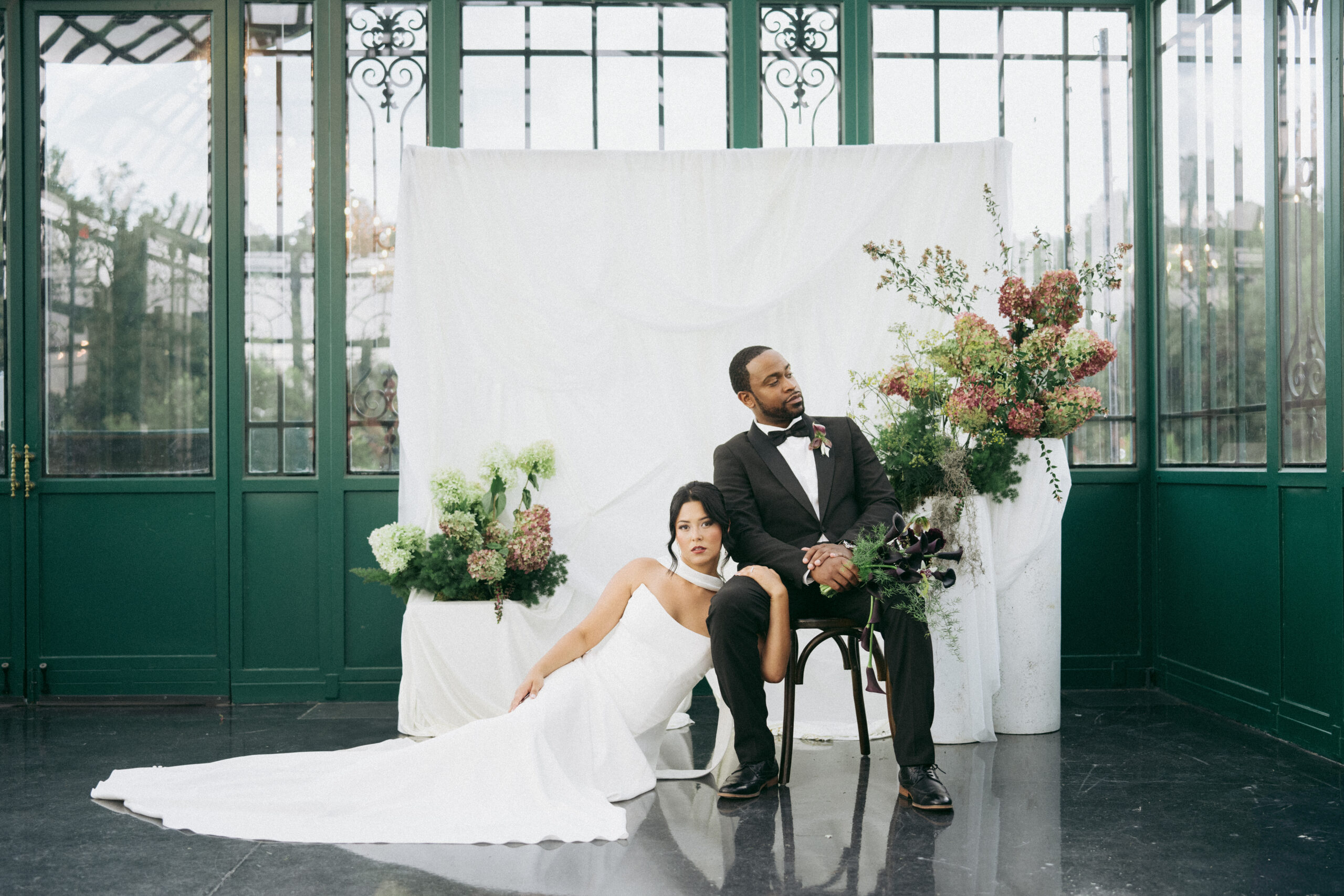 Editorial bridal portrait at The Little Chapel in Winston-Salem, NC. Bride and groom styled in modern elegance at a luxury wedding venue, photographed in fine art documentary style.
